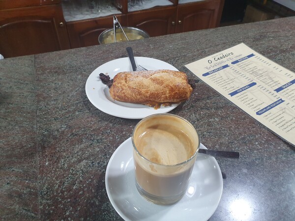 Highlight of the morning: Cafe con leche and a croissant chocolat. At O Pino.