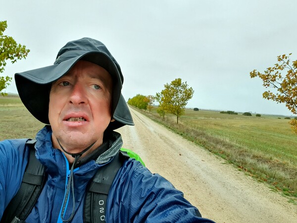 Soaking wet, 10 km after Carrión de los Condes. Second day in a row with rain all day rain.