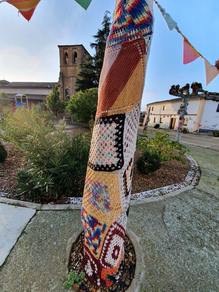 Funny, knitted protection for trees in Moratinos, Palencia