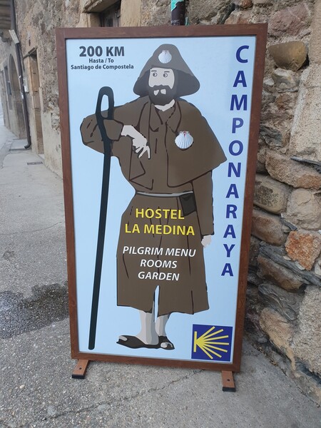 Day 21: Finally found the camino again. I was the only pilgrim in this albergue in Camponaraya. Yet, they gave me a full menu and a full bottle of wine.